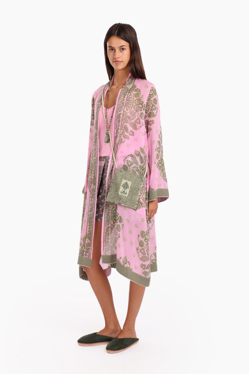 Embroidered small cross body bag in printed cotton